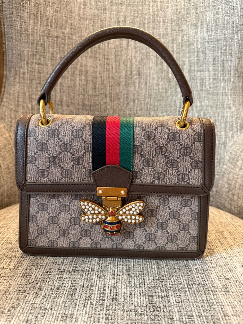 Designer-Inspired Brown Top-Handle Bag with Bee Accent